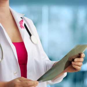 Doctor holding a mammogram